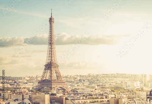famous Eiffel Tower and Paris roofs, Paris France, retro toned