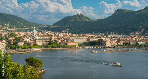 Panoramic view of Como city, overlooking the Lake Como, on a sunny summer afternoon. Italy.