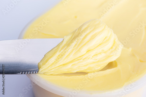 Cheese butter or margarine with knife