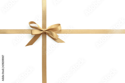 Golden ribbons with bow on white background