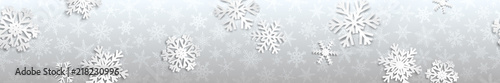 Christmas seamless banner with white snowflakes with shadows on gray background