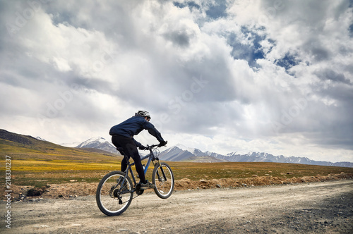 Man ride bicycle in the mountain