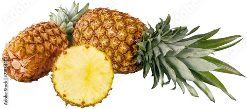 Ripe tropical pineapples on white background