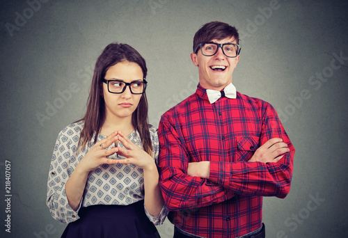 Young optimistic man and pessimistic woman