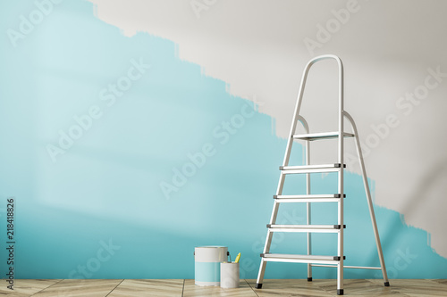 Half painted blue wall, ladder