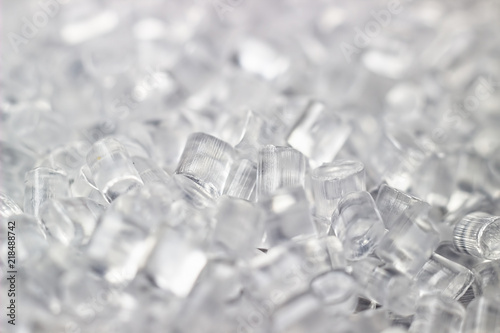 Background of plastic granules. Abstract background of artificial diamonds.