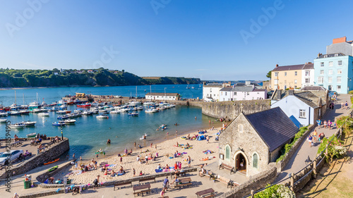 Panoroma of Tenby on a hot summer day, Wales, UK. A picturesque and colorful village on the coast of Wales.