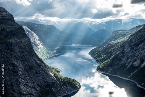 Beautiful fjord in Norway with amazing sun rays. View from the top