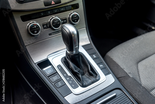 Closeup of automatic transmission inside car salon