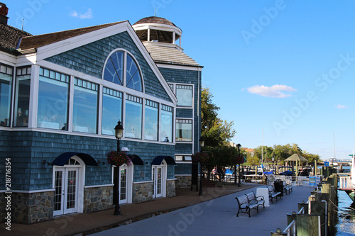 A historic building and boardwalk along the Potomac River waterfront, Old Town Alexandria, Virginia