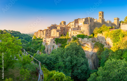 Panorama of the medieval town of Viturchiano located on the edge of the cliff, at sunset, Lazio. Italy. Europe