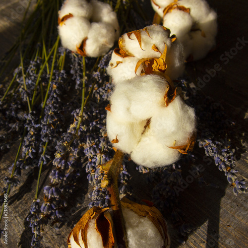 lavender and cotton on wooden table