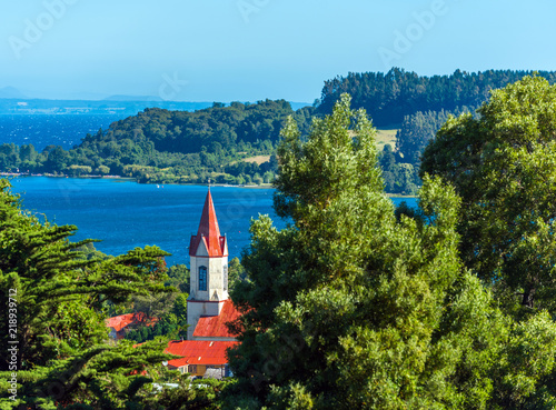 View of the church on the background of the river, Puerto Octay, Chile. Copy space for text.