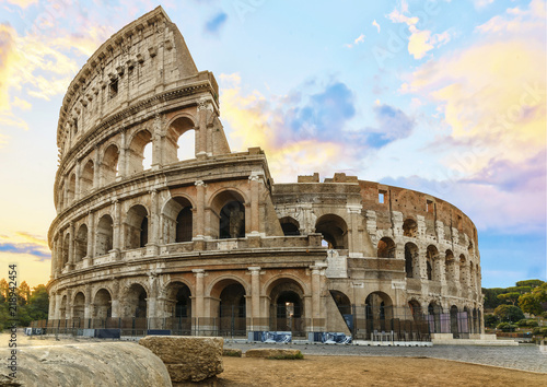 Colosseum in Rome at the Sunrise Time - Colosseum is one of the main travel attractions - The Main symbol of Rome