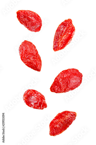 Flying Goji berry in a bowl on isolated