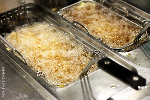 frying chipped potatoes in deep fat fryer