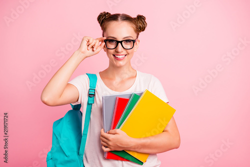 Time to prepare for lessons Young lovely reader girl hold multi