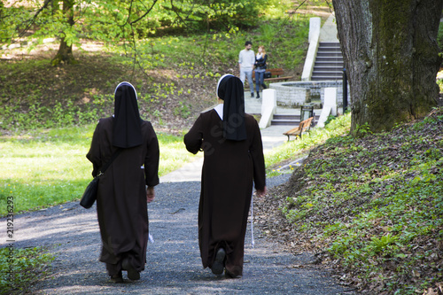 Nuns walking through the park