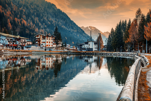 A small town in the Dolomites Italian Alps, a lake, a beautiful urban natural autumn landscape, Madonna di Campiglio