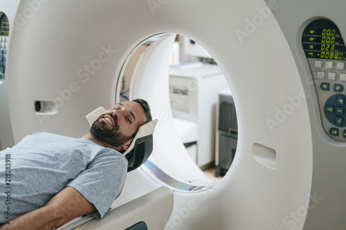 Patient Lying on the CT Scanner Bed