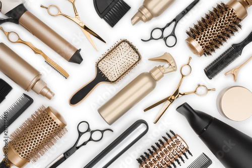 Full frame of professional hair dresser tools on white background
