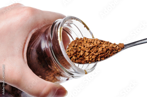 glass jar with instant coffee and spoon isolated