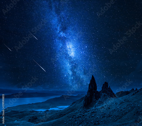Falling stars over Old Man of Storr at night, Scotland