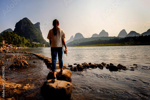 Stepping stone crossing on li river Yangshuo
