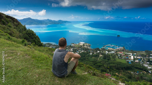 Relaxing On Top of Raiatea's Mt Topioi And Enjoying The Blue Lagoon - French Polynesia