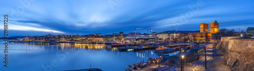 Oslo panorama night city skyline at Oslo City Hall and Harbour, Oslo Norway