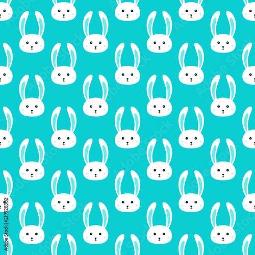 Repeated faces of cute rabbits. Seamless pattern for children.
