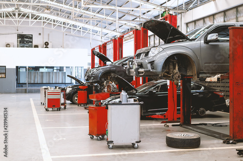 car repair station with soft-focus and over light in the background