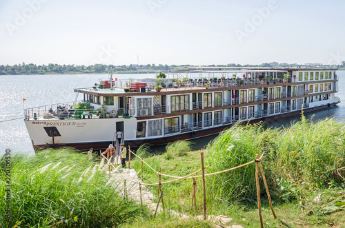 Cruise ship Mekong Prestige II anchored at the bank of Chong Koh island on the river Mekong