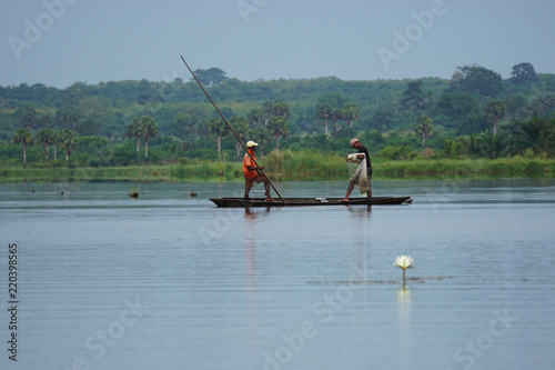 Fishermen in a conoe in the mono delta in Togo