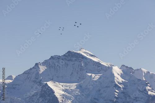 The Swiss Air Force flies a display over the Alps in the Bernese Oberland