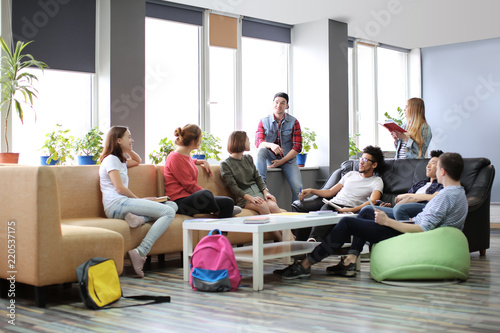 Students resting together in campus building