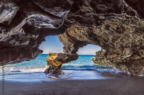 Amazing view of sea cave of Agios Pavlos in south Crete located next to the famous beach with the stunning sandhills.