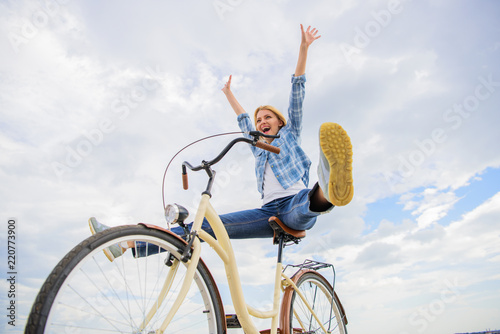 Cycling gives you feeling of freedom and independence. Girl rides bicycle sky background. Freedom and delight. Woman feels free while enjoy cycling. Most satisfying form of self transportation