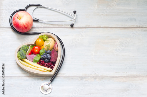 Healthy food in heart diet concept with stethoscope 