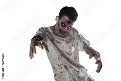 Creepy male zombie with bloody mouth on studio