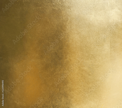 Shiny yellow leaf gold foil texture background