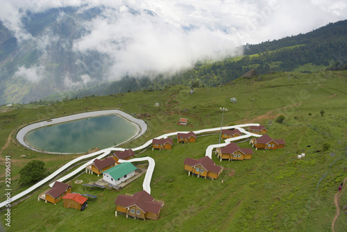 Aerial shot of Auli lake and houses, Auli, Chamoli district Uttarakhand, India