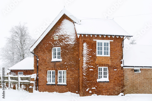 Old house in snow