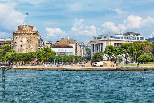Thessaloniki, Greece - August 16, 2018: The National Theatre of Northern Greece & Aristotle's Theatre Building and White Tower in Thessaloniki.