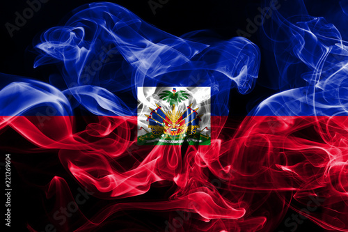 National flag of Haiti made from colored smoke isolated on black background