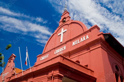 A great low angle shot of the red painted 18th century Christ Church in Malacca City, Malaysia.