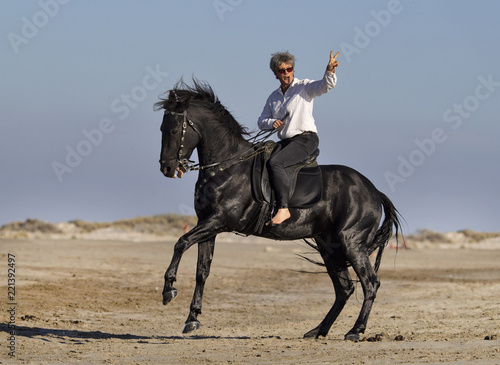 horsewoman on the beach