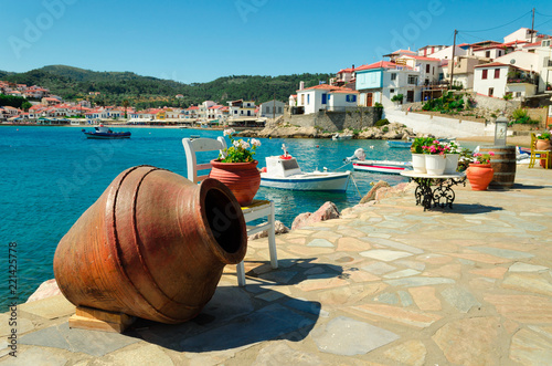 Amphora on the waterfront in small town Kokkari on the aegean island Samos