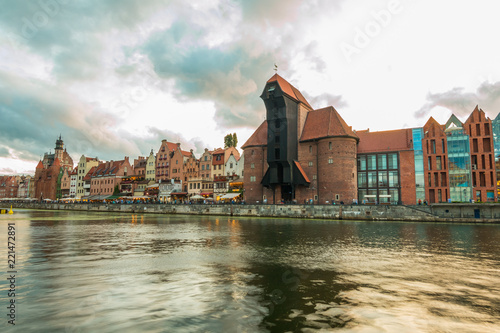 Gdansk, Poland - August 18, 2018: Gdansk (Danzig) at night with reflection in Motlawa river, Poland