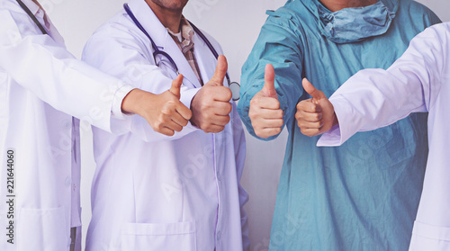 Doctors and Nurses coordinate hands.doctors thumb up, Concept Teamwork